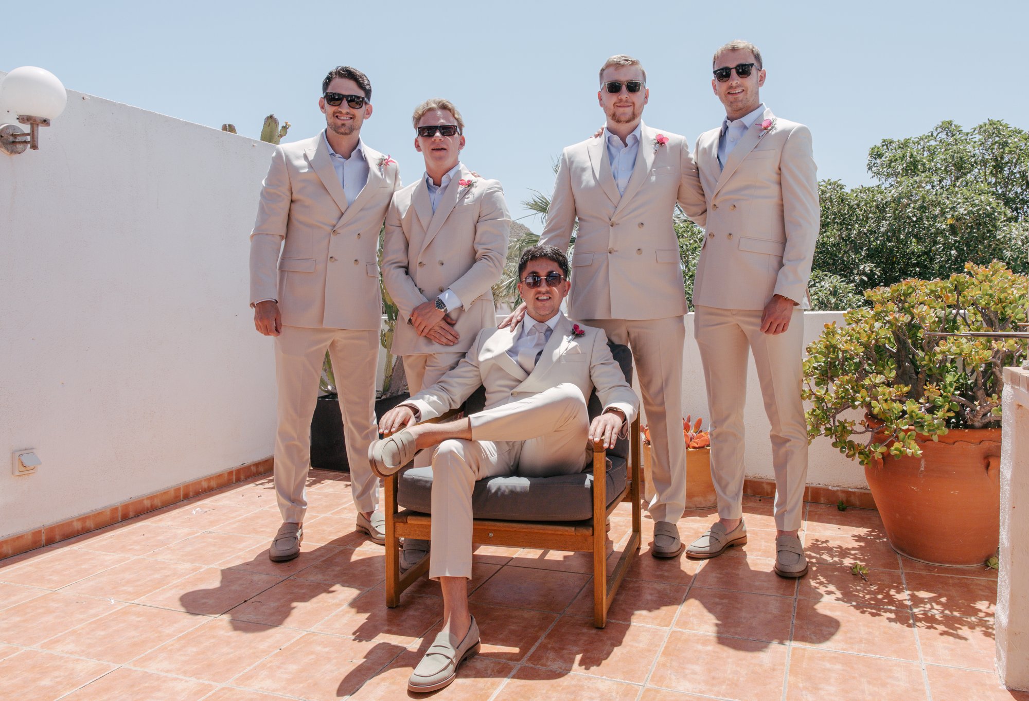 Groomsmen in beige linen suits, El Beach Agua Amarga, beach wedding Cabo de Gata