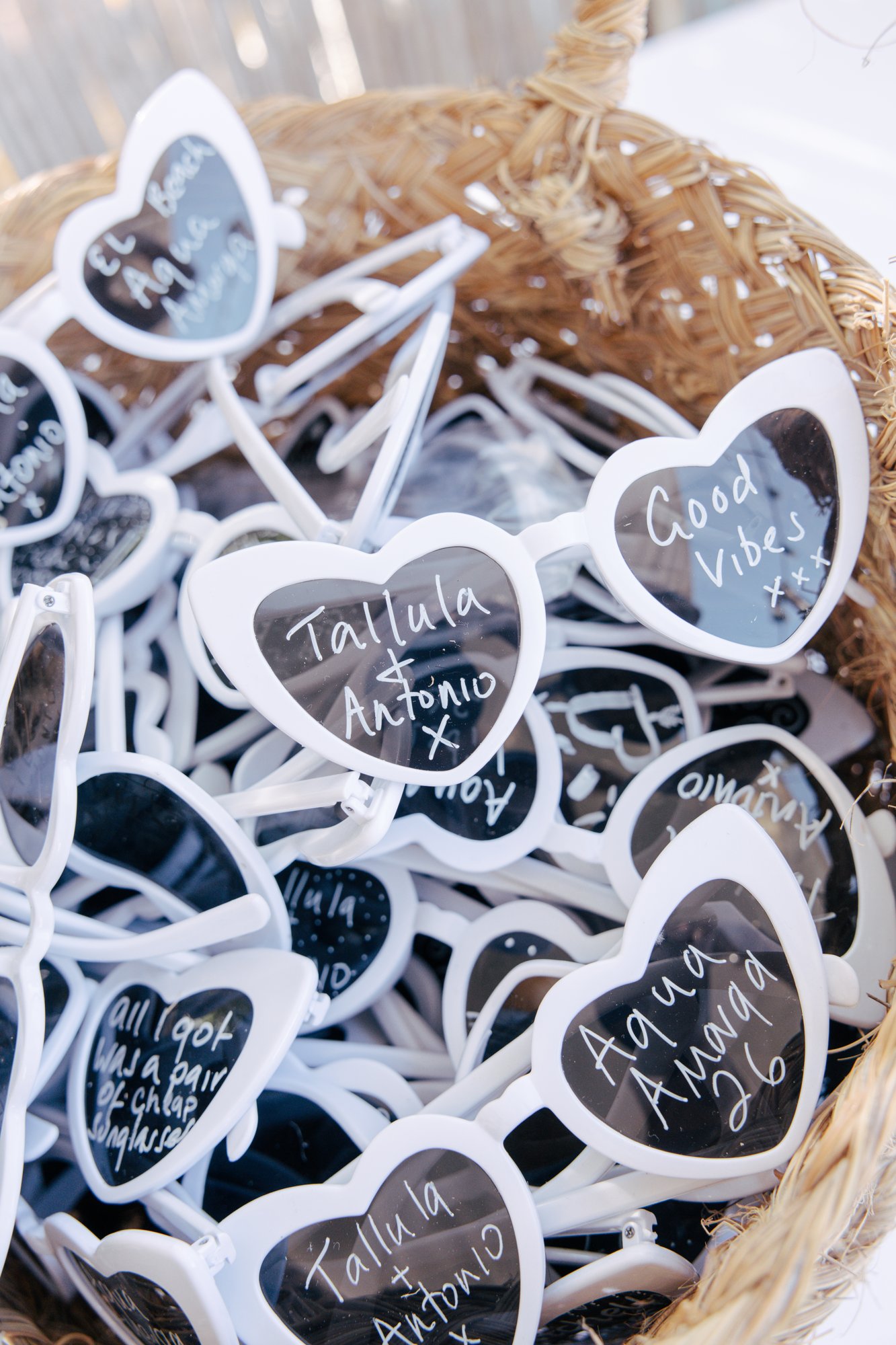 Heart-shaped sunglasses as guest favours, Agua Amarga, beach wedding