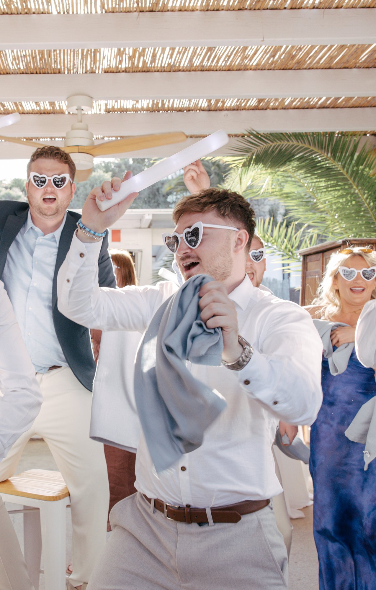 Guests dancing at the beach party, El Beach Agua Amarga, beach wedding Cabo de Gata