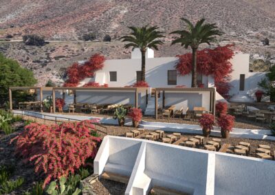 Weißer Cortijo über La Isleta del Moro mit Palmen und Terrassen, Hochzeitslocation in Cabo de Gata