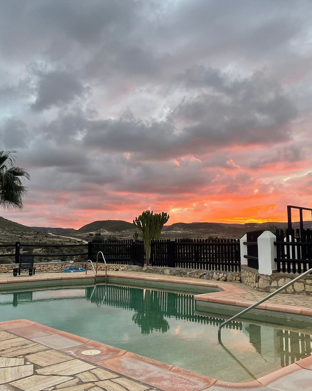 Finca pool near Agua Amarga at sunset