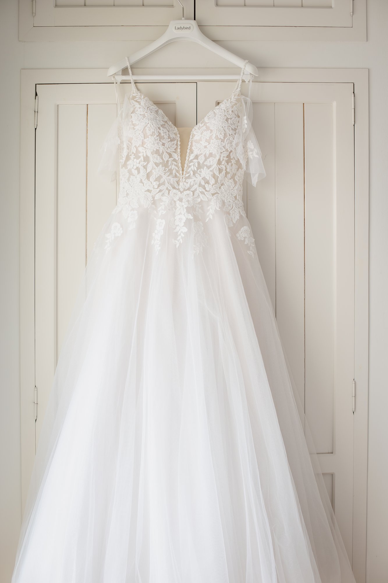 Lace wedding dress hanging on the wardrobe, getting ready, wedding Agua Amarga