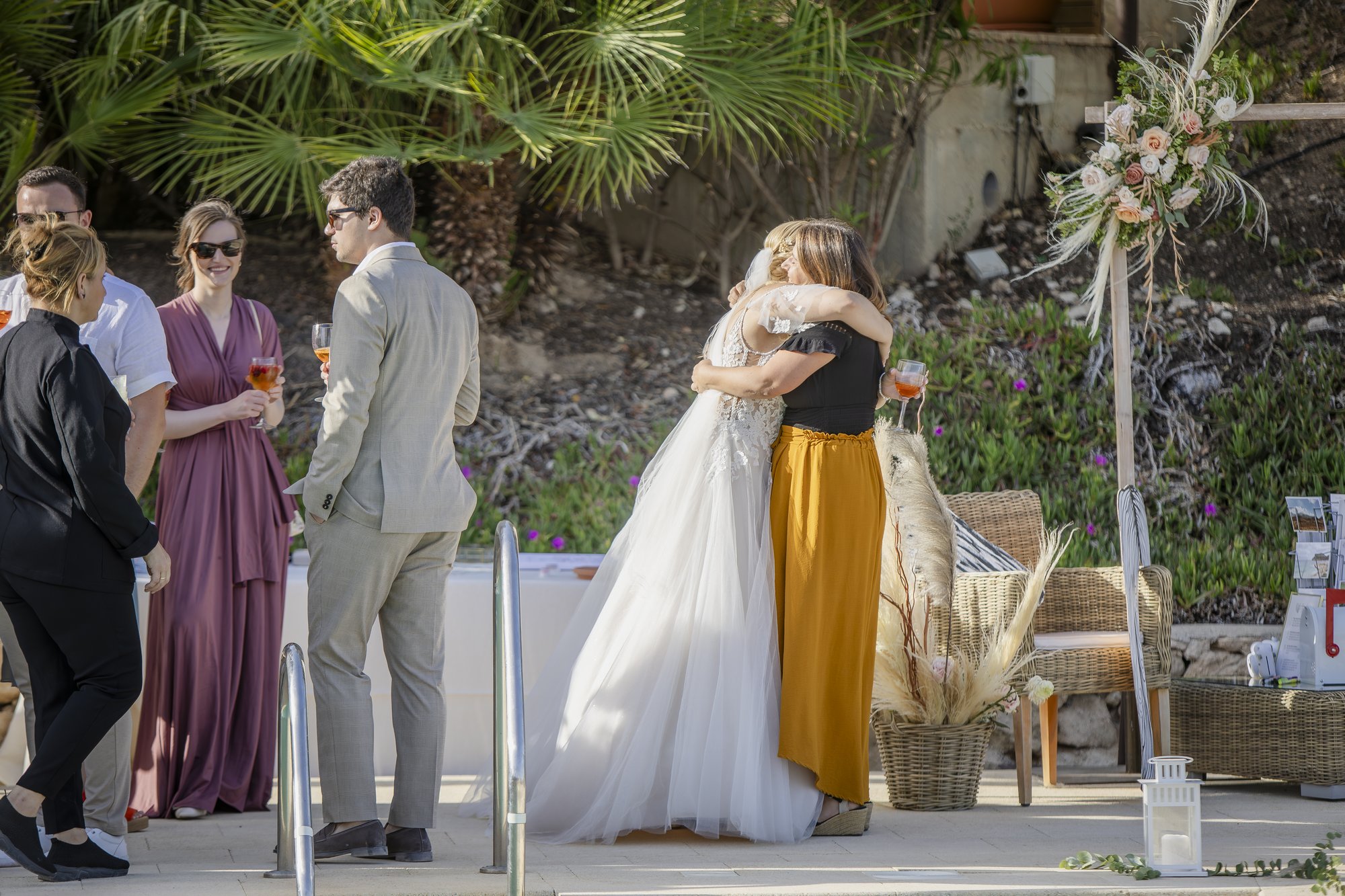Bride hugging the wedding planner at the reception, wedding Agua Amarga