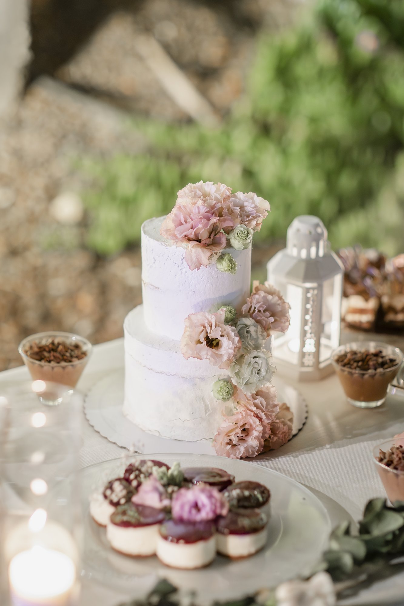 Wedding cake with roses at the sweet table, wedding Agua Amarga